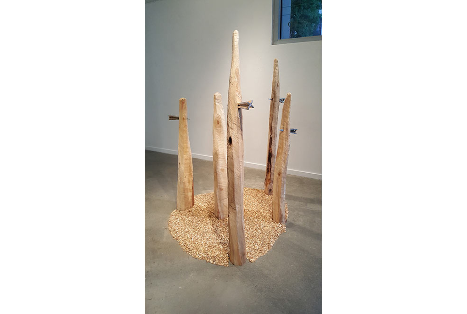 Protected, 2015, by Crowell A Pate IV; Poplar, bronze, stone; 75 x 75 x 78 inches; Courtesy of the artist.