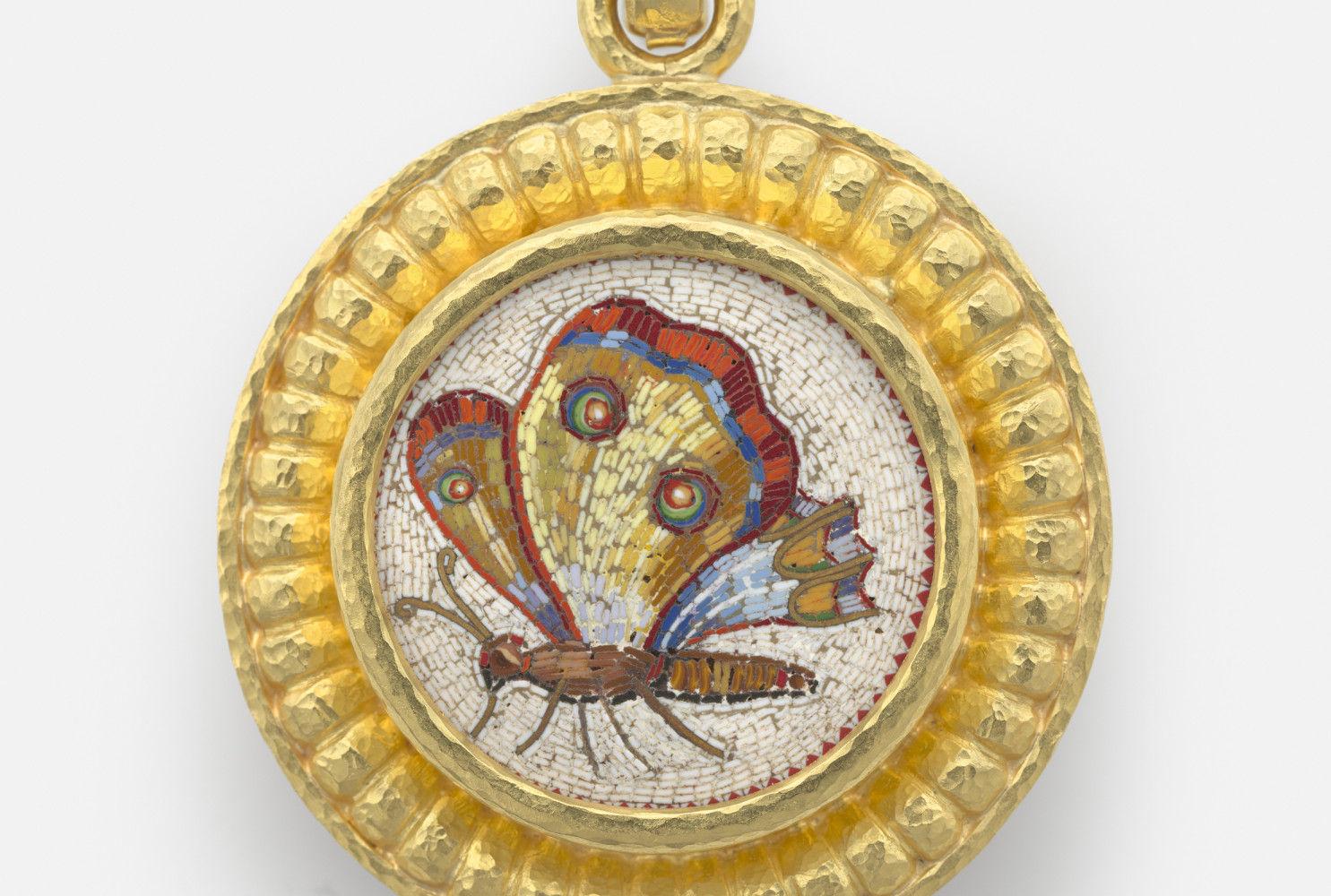 Walking Butterfly, 19th century, attributed to Giacomo Raffaelli (Italian, 1753–1836); Micromosaic set in gold as a pendant, with gold bezel, hinged bale; 35 x 35 mm; Collection of Elizabeth Locke

Photo: Travis Fullerton, Virginia Museum of Fine Arts
