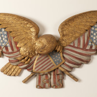 Eagle and Flags Plaque, 1875—1900, Unidentified artist, White pine, paint, and gilt, Courtesy of the Barbara L. Gordon Collection
