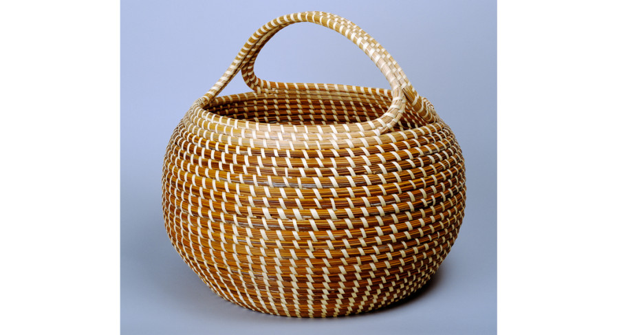 <i>Cobra with Handle</i>, ca. 1980, by Mary Jackson (American, b. 1945); sweetgrass, bulrush, palmetto, and pine needles; 15 x 16 inches; Museum purchase with funds donated by Mr. Robert Marks; 1984.026