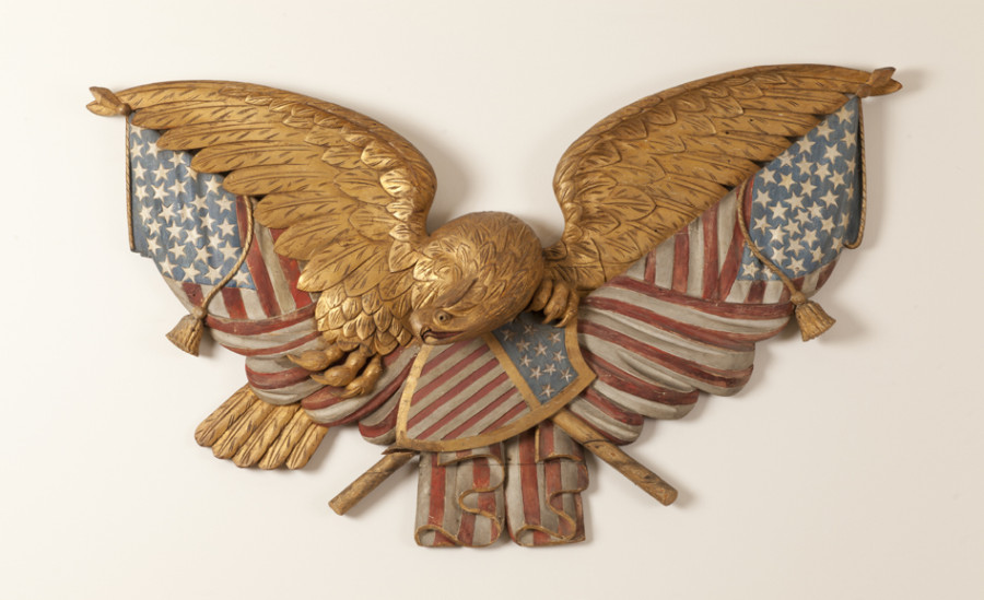 <i>Eagle and Flags Plaque</i>, 1875—1900, Unidentified artist, White pine, paint, and gilt, Courtesy of the Barbara L. Gordon Collection
