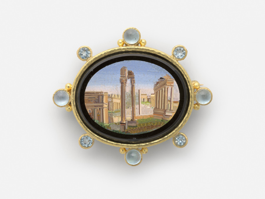<i>Roman Forum, Rome</i>, 19th century; Micromosaic set in gold as a brooch, with alternating 6-mm cabochon aquamarines with side gold dots and 5-mm faceted aquamarines around bezel, 54 x 62 mm. Collection of Elizabeth Locke; Photo: Travis Fullerton; © Virginia Museum of Fine Arts

