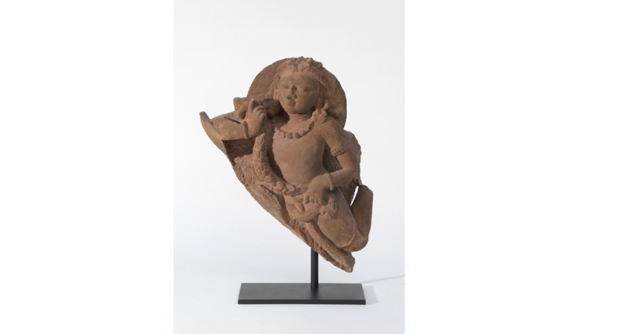 <i>A vidyadhara (wisdom holder) or flying spirit</i>; ca. 6th century; Fragment of a larger sandstone sculpture; India, Uttar Pradesh; Courtesy of a private collection