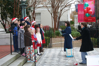 Mt. Pleasant Presbyterian Children's Choir caroling on the museum steps