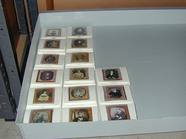 Cased photographs in their new storage container