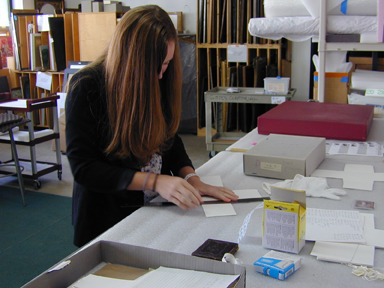 Laura Reece measuring archival board