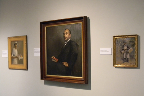 Gallery Installation View (left to right): The Nurse, 1917; Portrait of Reverend Caesar S. Ledbetter, 1921; and The Honey Man, ca. 1929, all by Edwin Harleston (American, 1882 – 1931).