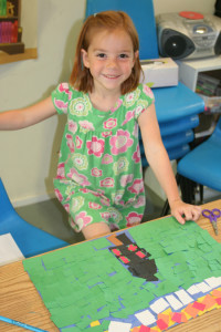 Ella creates a mosaic based on ancient Roman designs during "Art of the Ancient World."