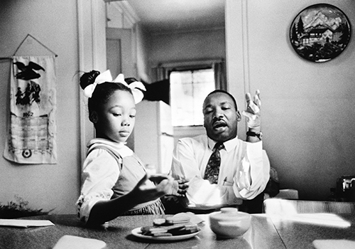 Dr. Martin Luther King, Jr., with his daughter, Yolanda, by James Karales