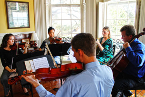 CMC performs a house concert at The Palmer House on the Battery.