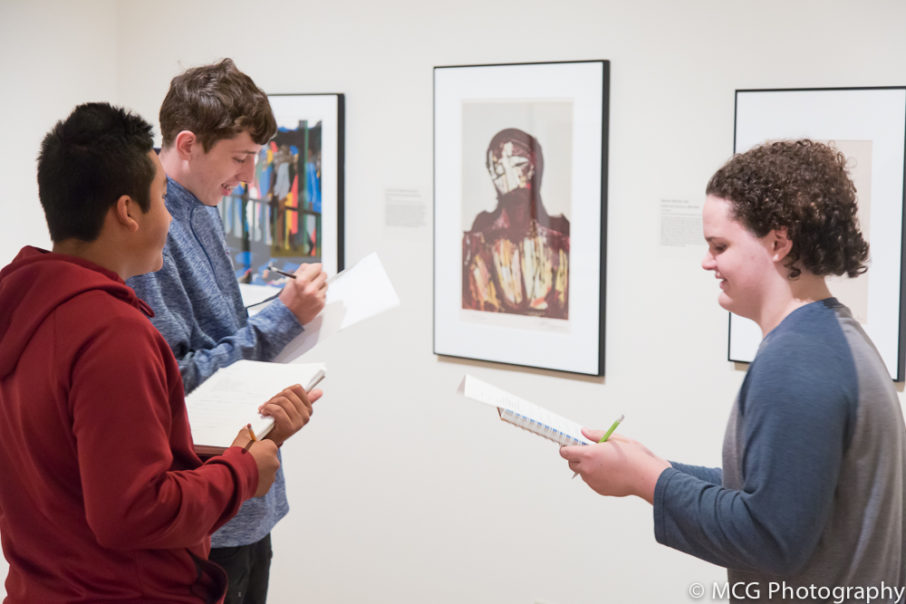 Students engage with artwork during an in-gallery activity