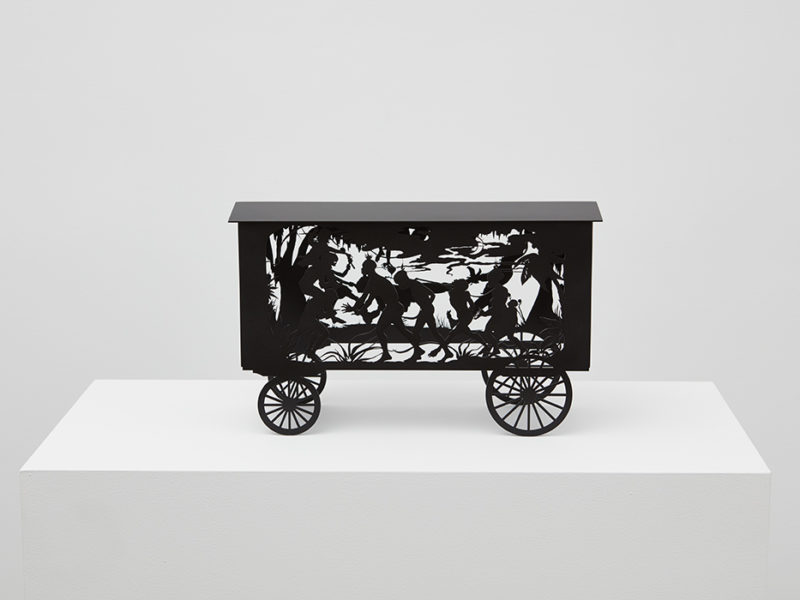 The Katastwóf Karavan (maquette), 2017, by Kara Walker; painted laser-cut stainless steel; 9 x 14 1/2 x 5 1/2 inches; Edition 30 of 30; Museum purchase; image courtesy of Sekkima Jenkins & Co.