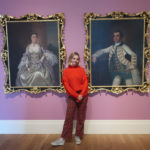 Gibbes Education Intern Brittany Marino poses in the main gallery. Brittany loves sharing her passion for the arts with the many students who visit the Museum on field trips.