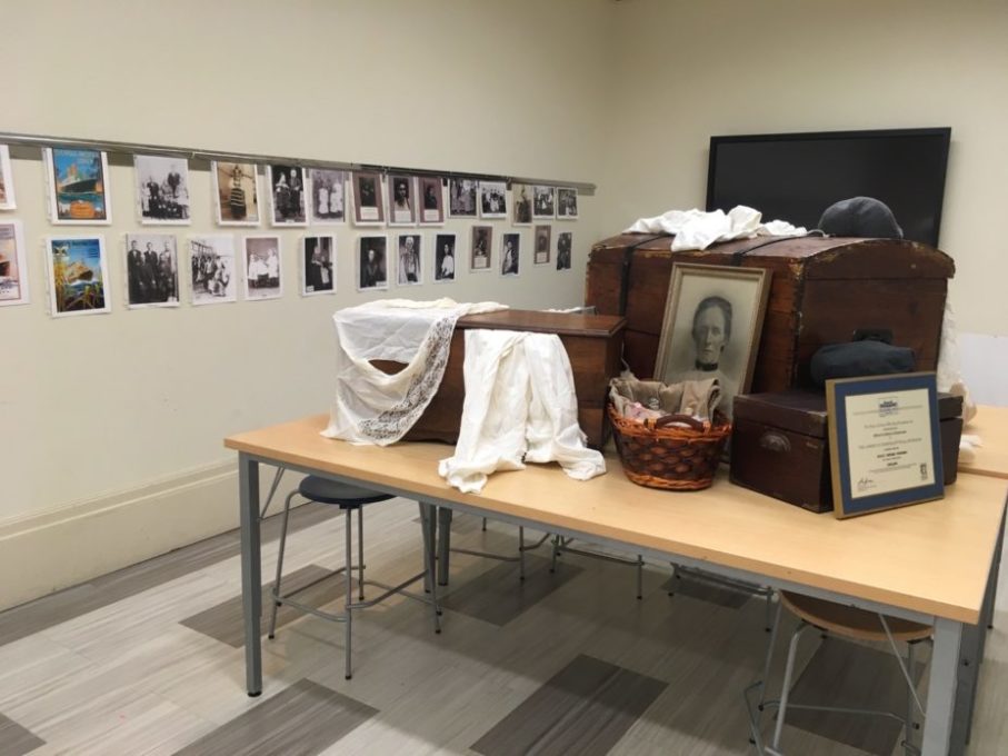 We used other people’s family portraits and even a real trunk that came over steerage with a Bohemian family in 1907 to create our “gallery room” to help the students imagine the many objects people brought with them on their voyage.