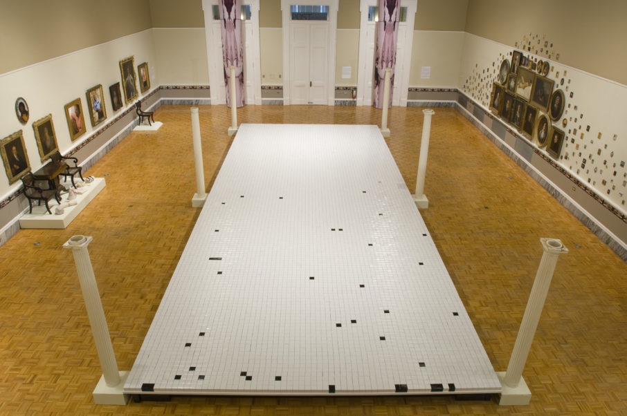 This installation by Juan Logan and Susan Harbage Page shows the ratio of artwork in the Gibbs collection created by European American artists, represented by white boxes, versus those works created by African American artists. Photo courtesy of Rick Rhodes Photography.