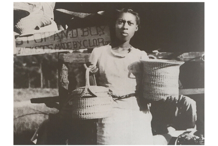 Viola Jefferson, photographed in 1938 on Hamlin Rd. in Mt. Pleasant by Bluford Muir (active 1940s.) Courtesy of USDA Forest Service. Reproduced Dale Rosengarten, "Babylon Is Falling: The State of the Art of Sweetgrass Basketry." Southern Cultures 24, no. 2 (2018): 98-124.